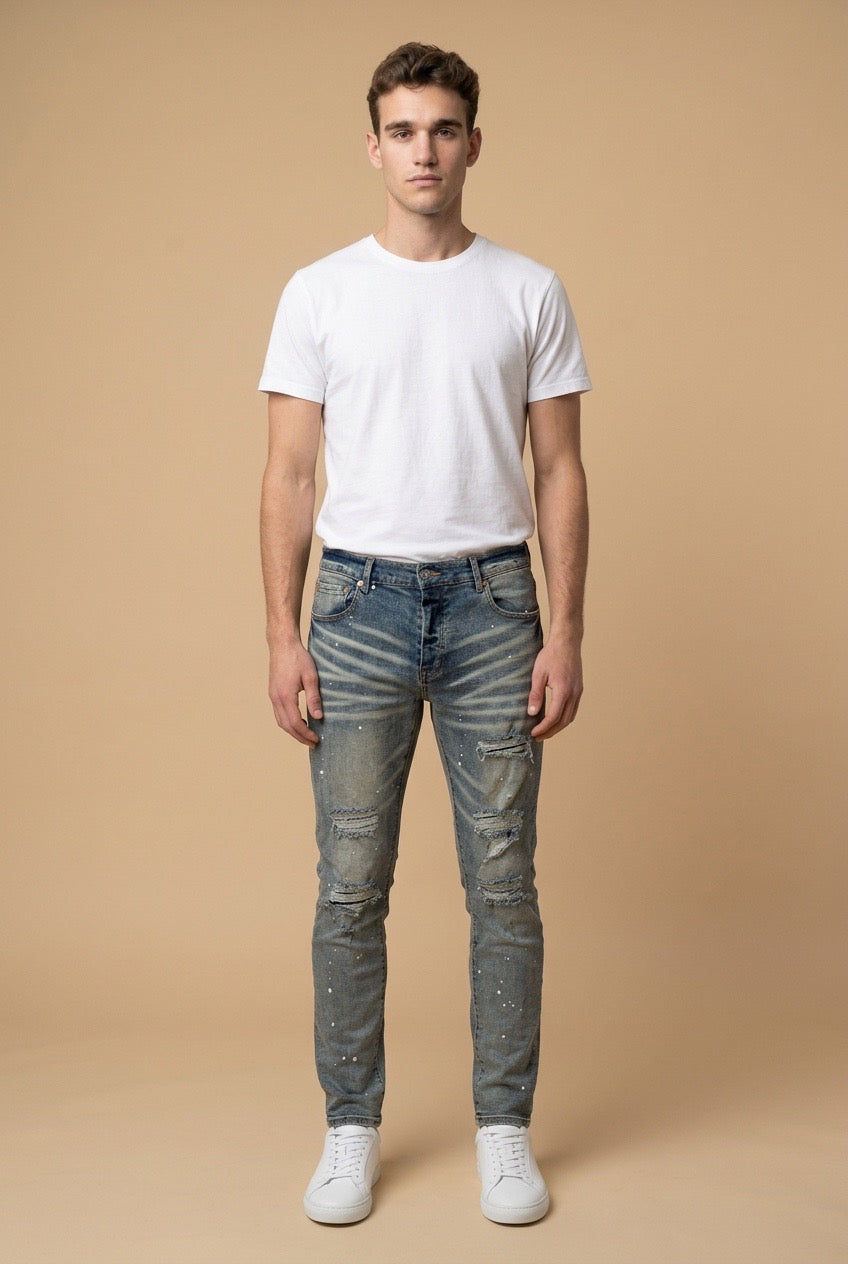 Purple Brand Distressed and Faded Blue Jeans with Paint Splatters